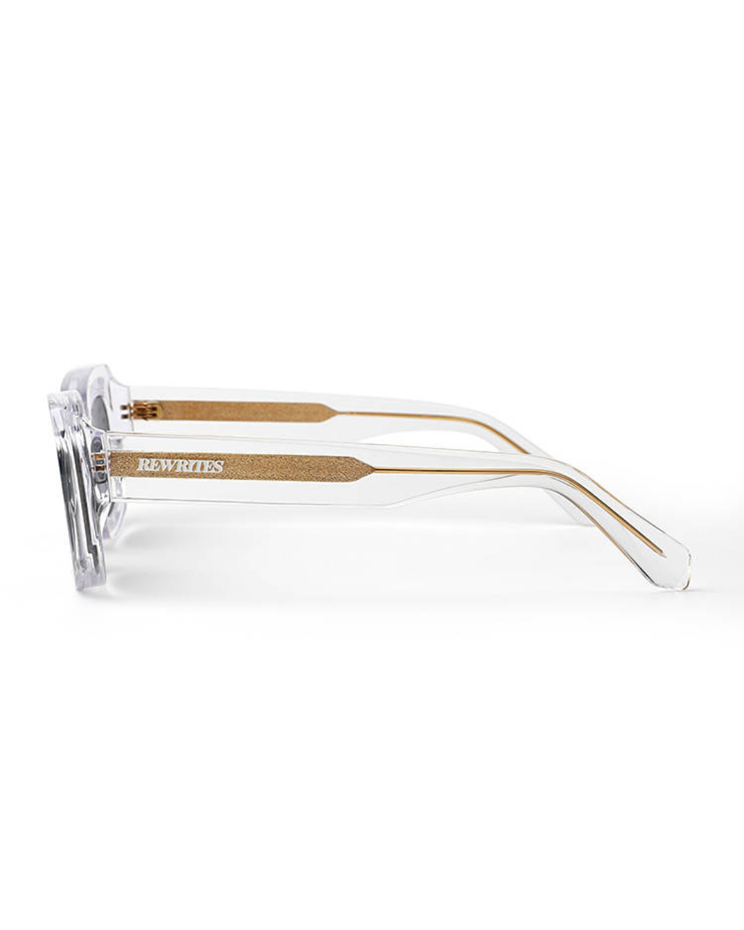 Side view of Rewrites Limited Edition Unfazed Sunglasses – a tactile masterpiece designed for style and durability. Handcrafted in Italy from Mazzucchelli acetate, these unisex sunglasses feature a sturdy fit and universal sizing. The thick transparent frame and grey see-through lens offer high visual and polarization clarity, with a scratch-resistant coating for added longevity.